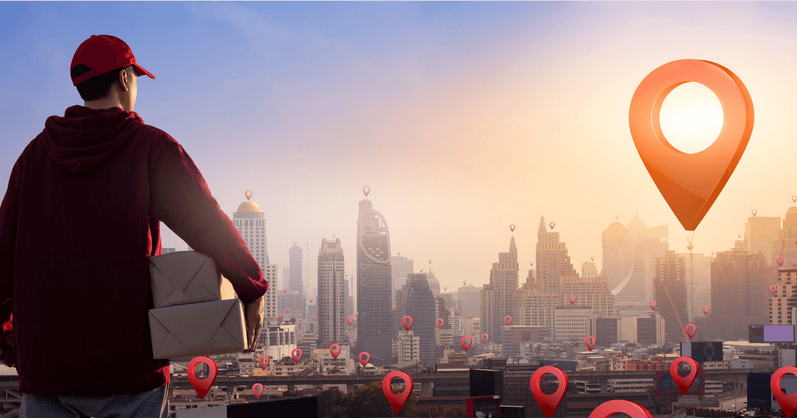 a delivery man overlooking a cityscape full of destinations to deliver to